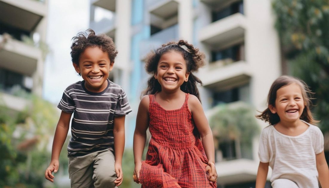 happy children of mixed cultures living in commission flats in urban melbourne